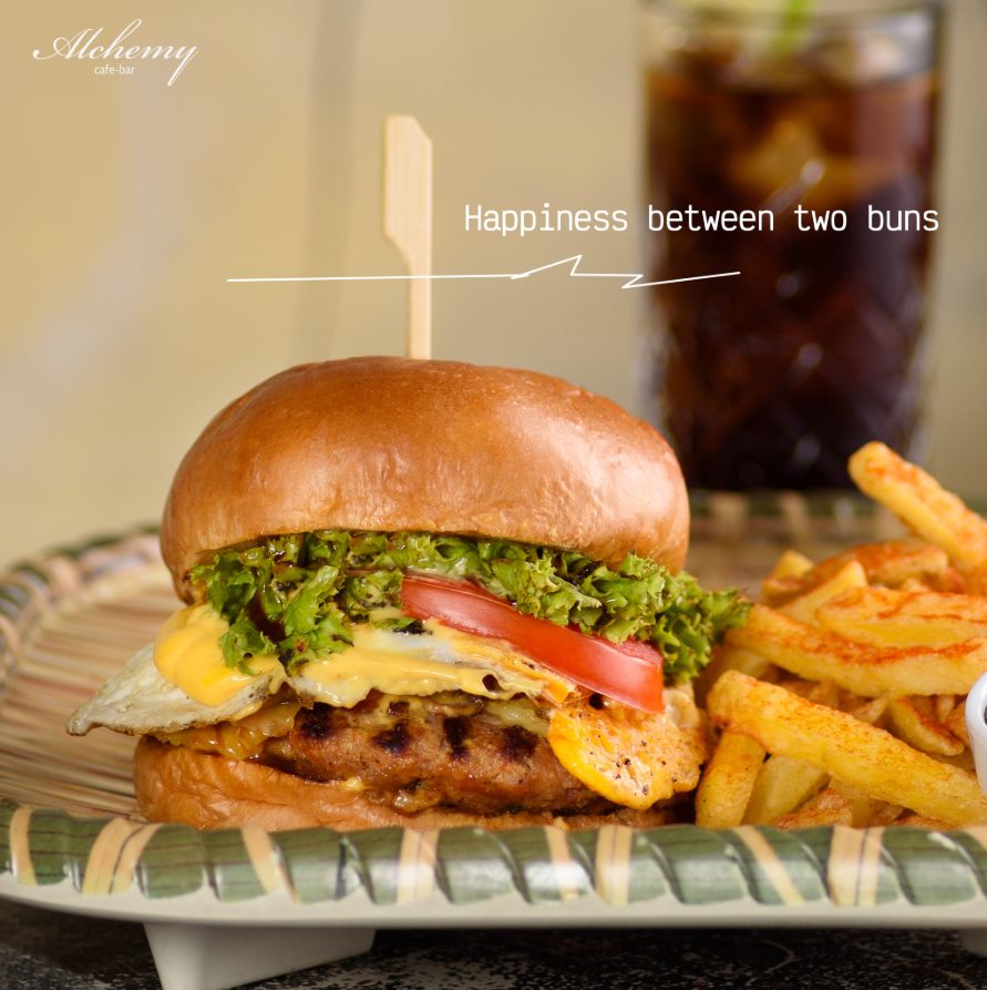 Alchemy burger served with fries