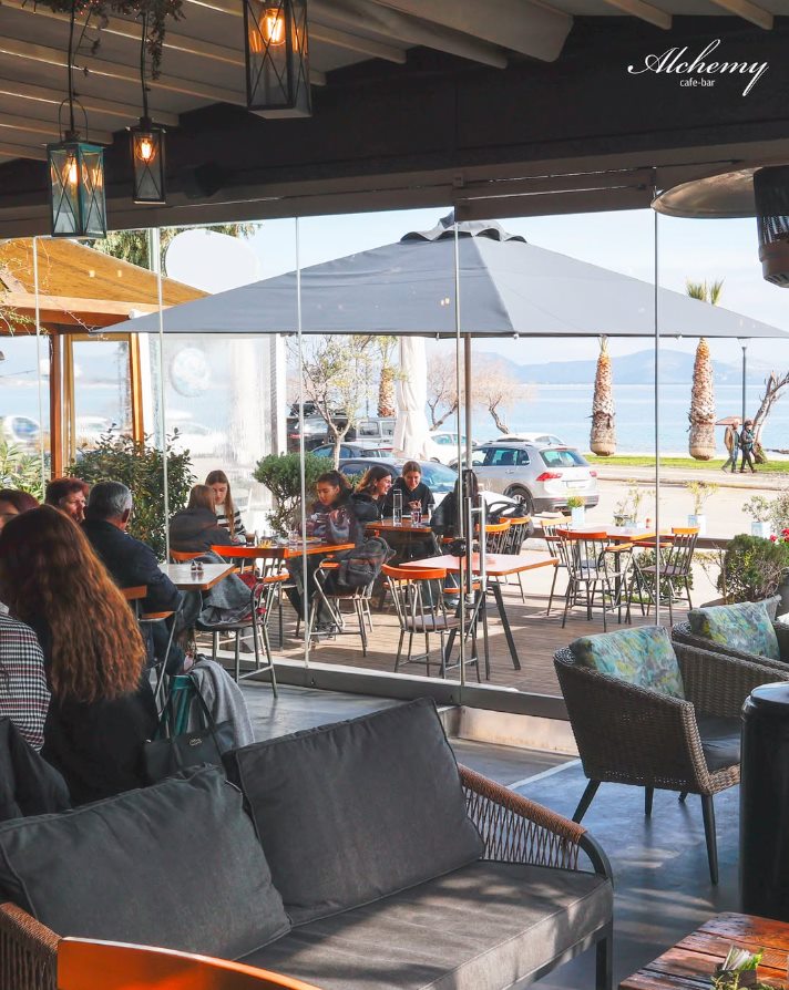 Alchemy Cafe Bar interior overlooking the sea